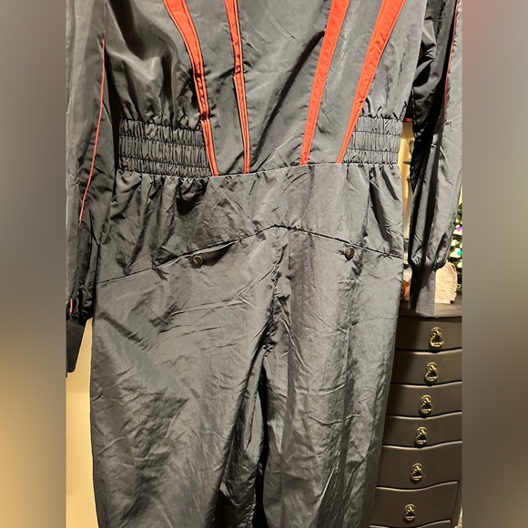 NWOT FREE PEOPLE Movement 
Go For Gold Onesie In Midnight Navy 
$168MSRP - Picture 5 of 12